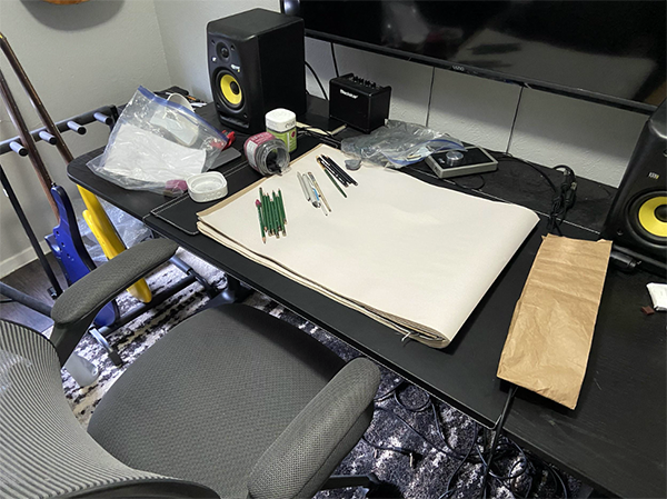 Desk with pencils and paper