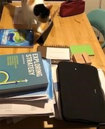 Books and Paper on wooden desk top