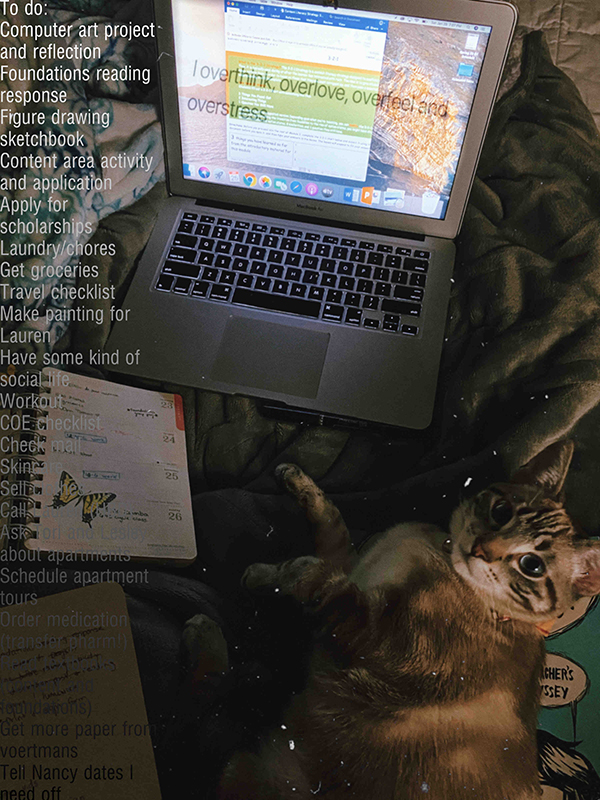 Desktop with an open laptop and a long to-do list