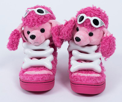 Frontal view of shoes designed by Jeremy Scott that look like pink poodles