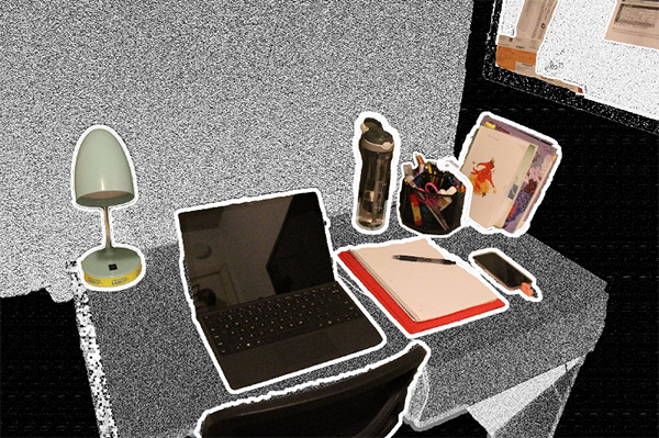 Gray background, gray desk with laptop, lamp, pencil holder