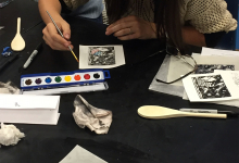 Printmaking workshop- participants using paint on project