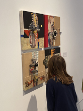 Image of student looking at artwork in the CVAD Galleries during a tour