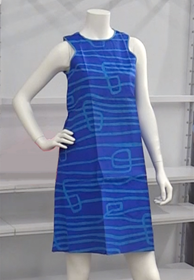 Royal blue dress with light blue vertical design on a mannequin